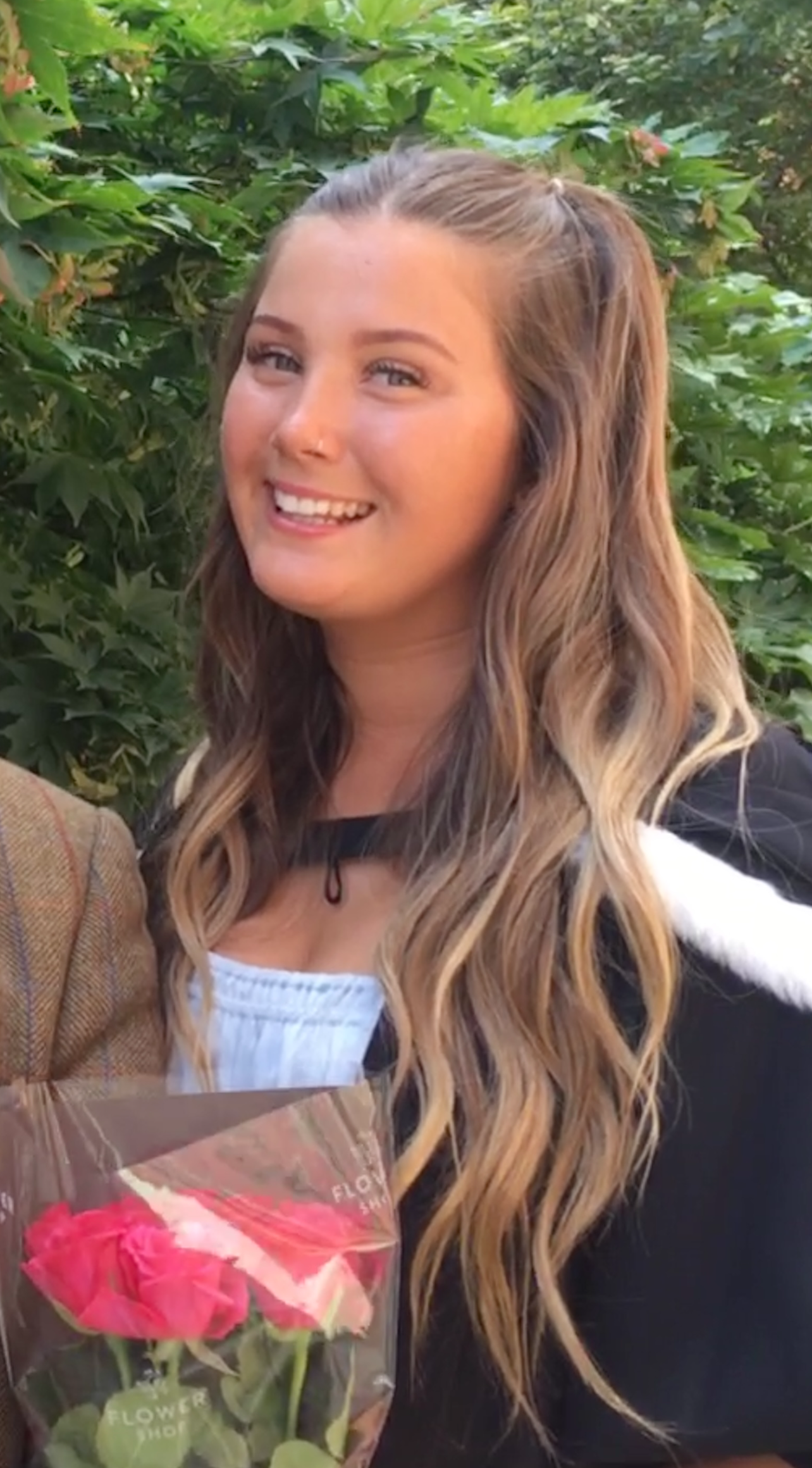 Maddie in her graduation gown